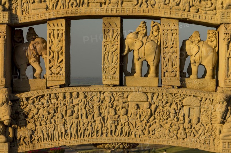 Detailed carvings including images of scanes from the Buddhas life. North Torana