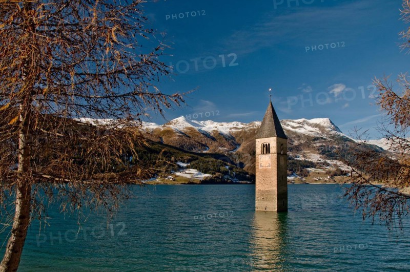 Church tower of the former parish church of Saint Katahrina of Graun in Lake Reschen