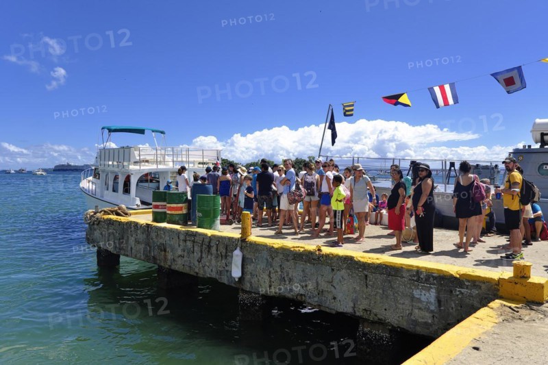 Tourists waiting for the whale watching boat