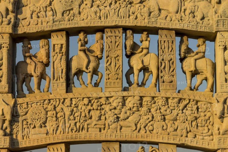 Detailed carvings including images of scanes from the Buddhas life. North Torana