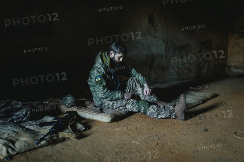 Soldier on his sleeping pad in his units accommodation