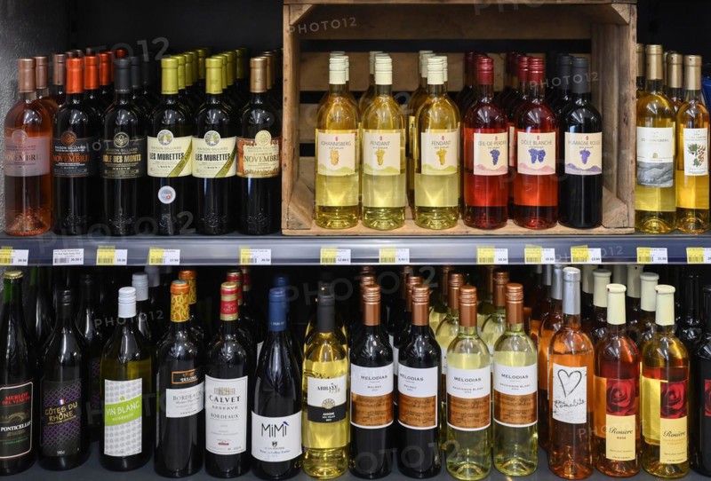 Sales rack various wine bottles