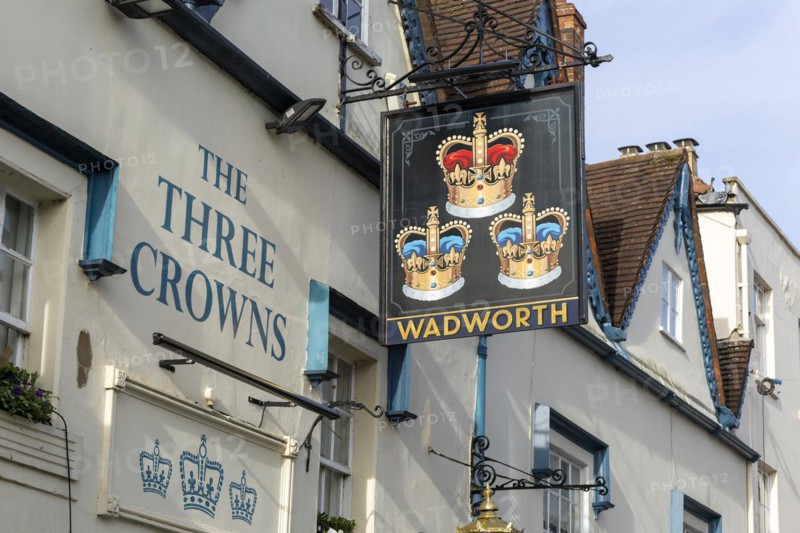 Pub sign for Wadworth brewery Three Crowns inn