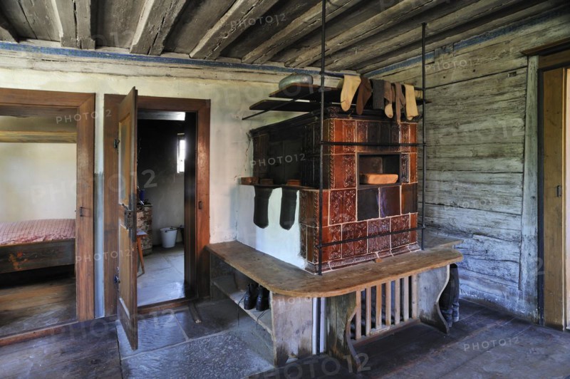 Living room with tiled stove