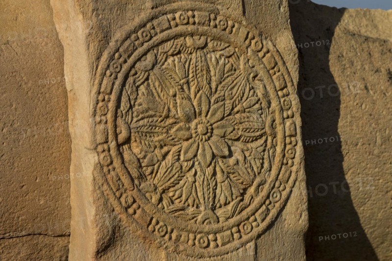 A carved medallion