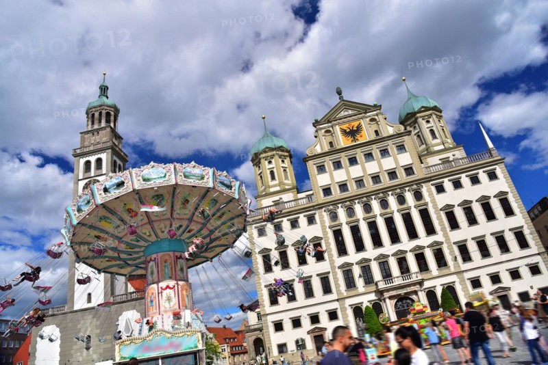 Chain carousel on Augsburgs town hall square in front of the town hall and the Perlachturm