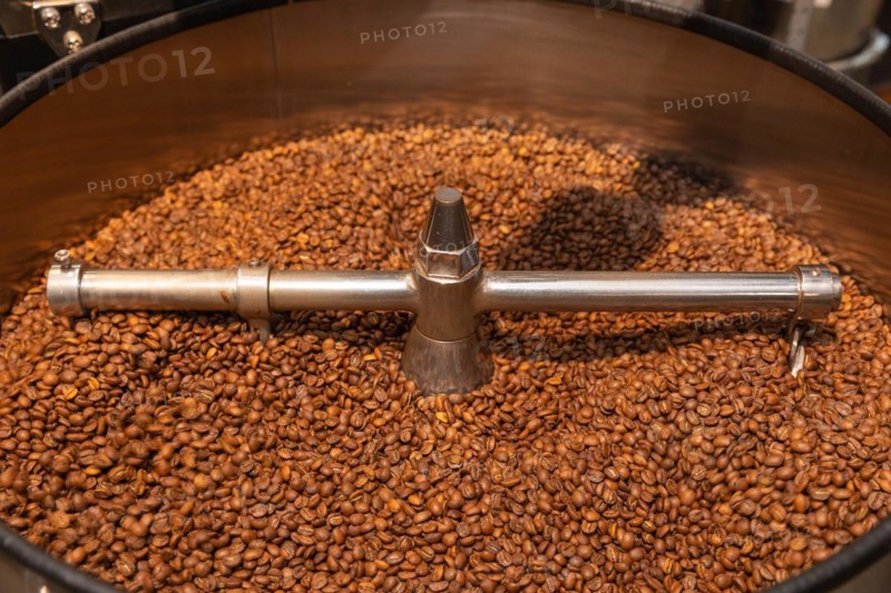 Roasted coffee in a cooling kettle