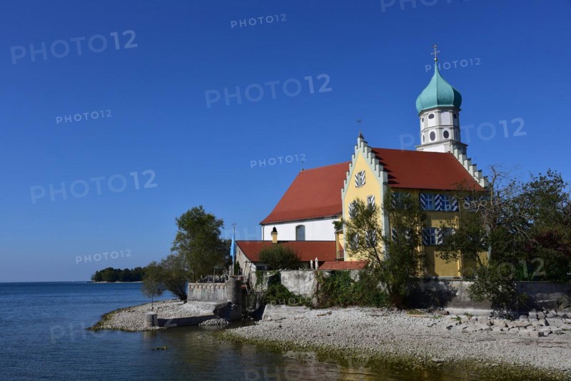 St. Georges Catholic Parish Church in moated castle am Lake Constance