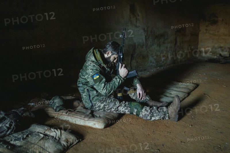 Soldier on his sleeping pad in his units accommodation