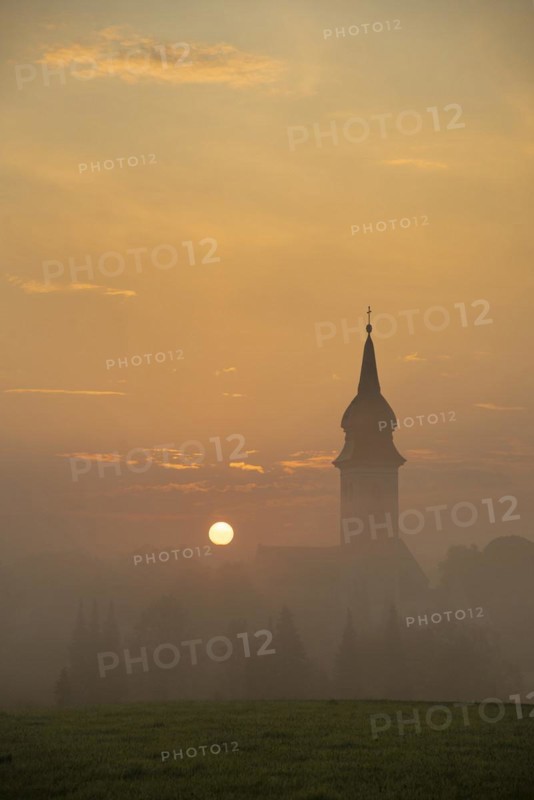 Sunrise in Rottenbuch behind the Church of the Nativity of the Virgin Mary