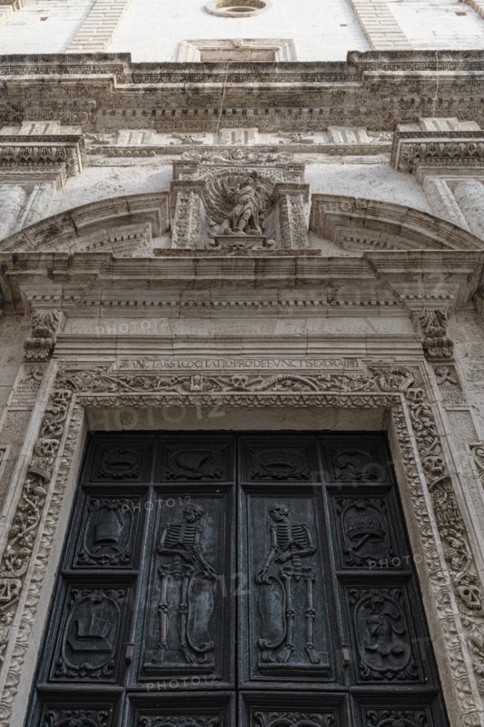 Relief of skeletons on the portal of the Chiesa Rettoria Santa Maria del Suffragio