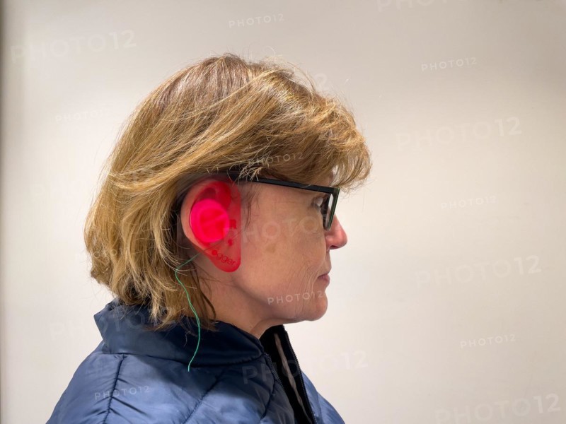 Fabrication of mould ear mould otoplasty in red for right ear hearing aids for in-the-ear hearing aids in-ear hearing aids for better hearing