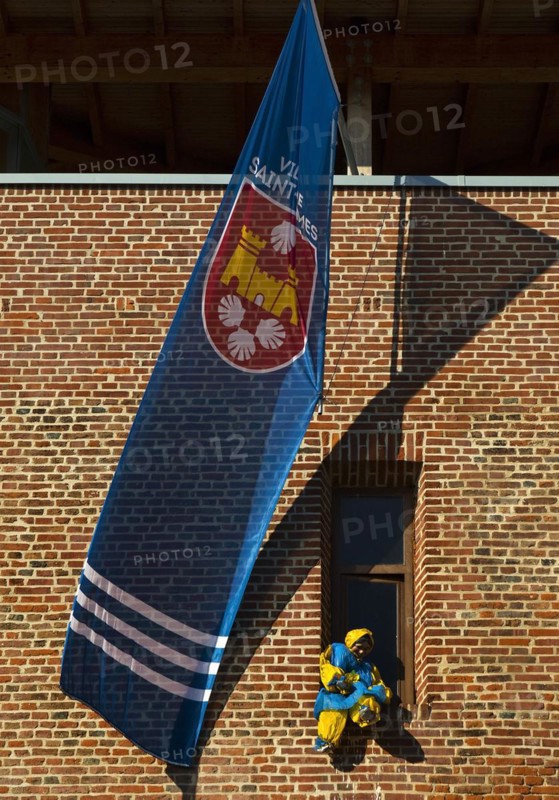 Flag of the twin town Saint-James France and Moehne in the window of the castle at carnival time