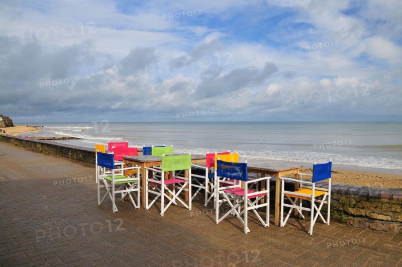 Chairs on the waterfront in Saint-Aubin-sur-Mer in the department of Calvados