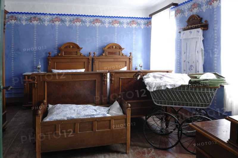 Bedroom in front cradle and pram