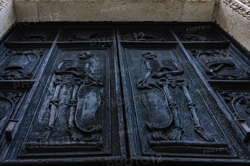 Relief of skeletons on the portal of the Chiesa Rettoria Santa Maria del Suffragio