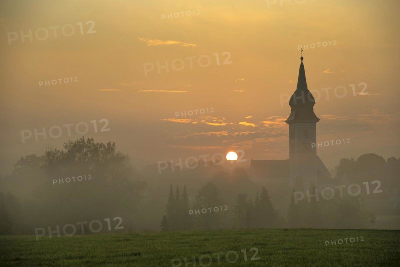 Sunrise in Rottenbuch behind the Church of the Nativity of the Virgin Mary