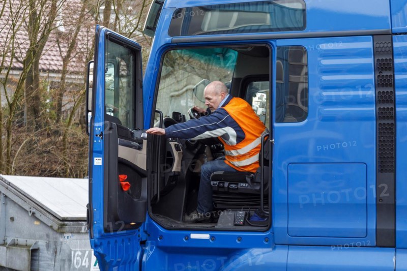 Professional driver in the drivers cab