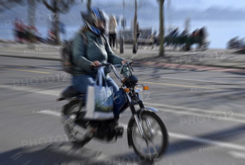 Wiping picture moped rider