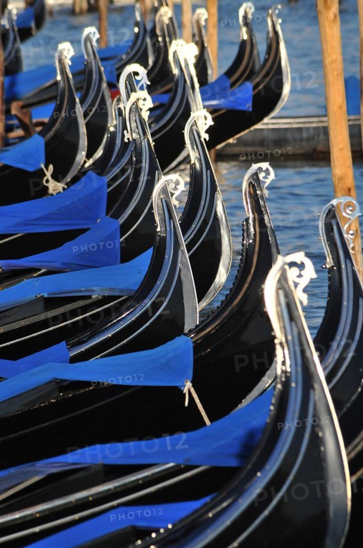 Gondolas on the pier of St Marks Square in Venice