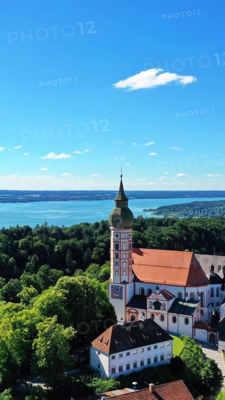 Aerial view of Andechs Monastery with the Lake Ammer lake in the background. Andechs