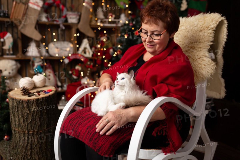 Grandmother is sitting on a rocking chair
