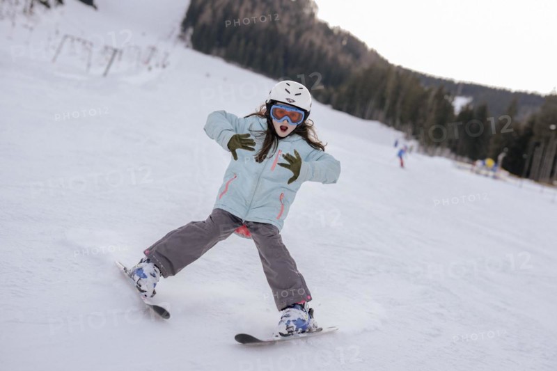 Girls skiing