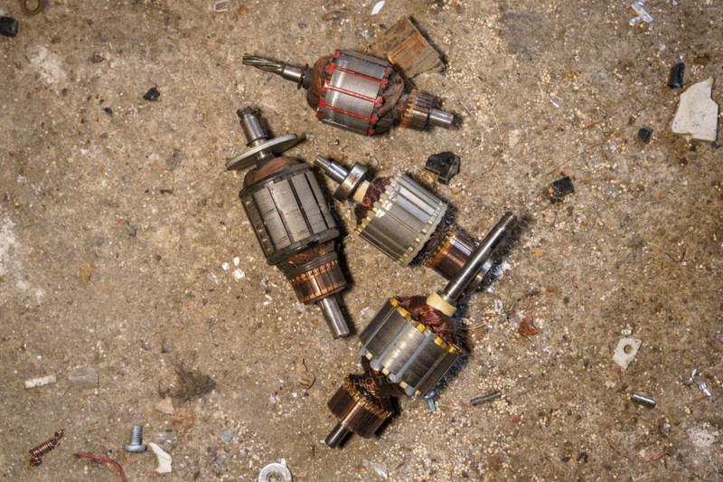 Old coils taken out of electric motors. Recycling of steel waste