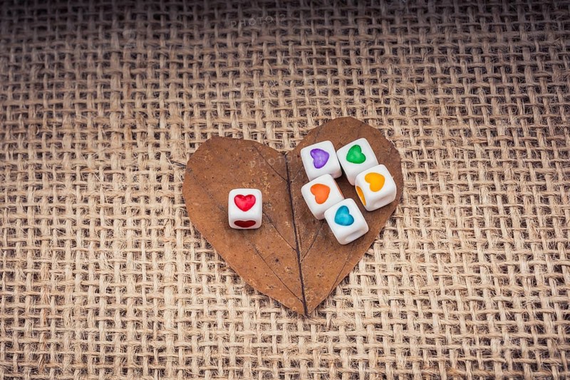 Colorful cubes with a heart on leaf on canvas
