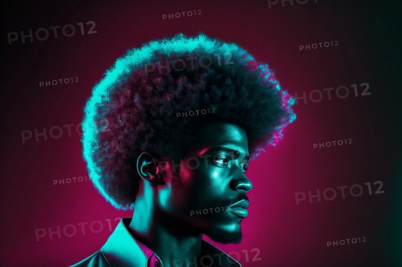 Black man with afro hair looking sideways at camera and backlit with turquoise and pink neon and laser light rays on dark background. Ai generated