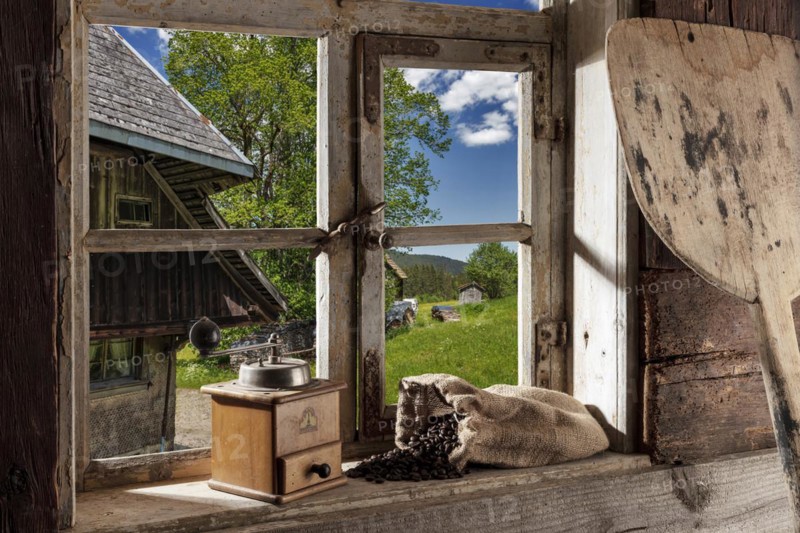 Farmhouse parlour with coffee grinder and coffee beans on the windowsill