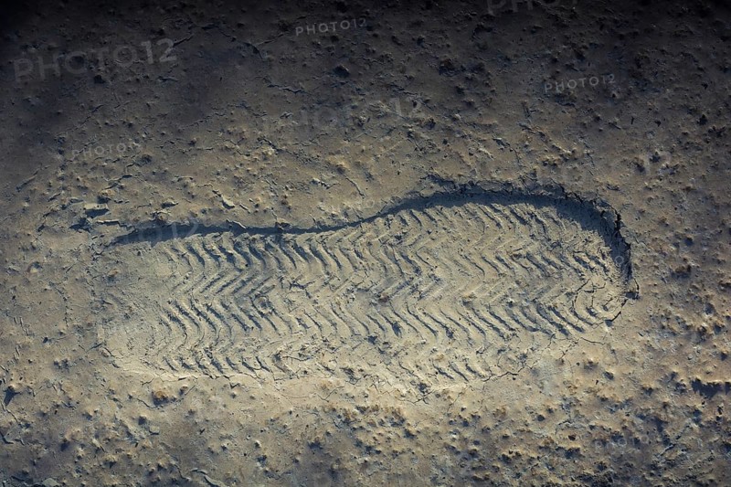 Footstep pattern seen on a concrete background