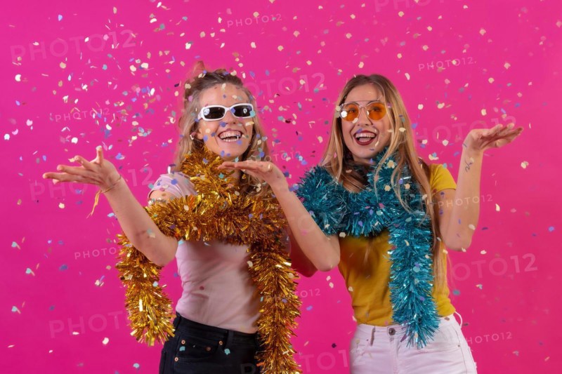 Two young blonde caucasian women partying