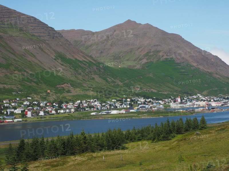Blue sky over fjord