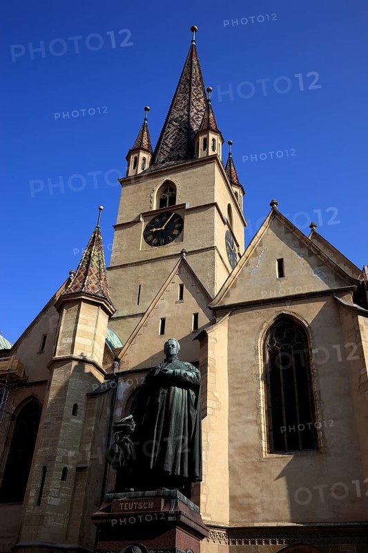 Protestant town parish church and statue of Friedrich Teutsch