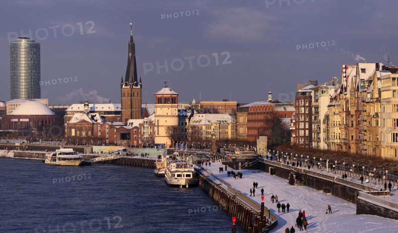 Rhine bank and old town in the snow