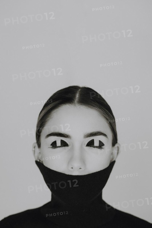 Woman with closed eyes and special eye make-up