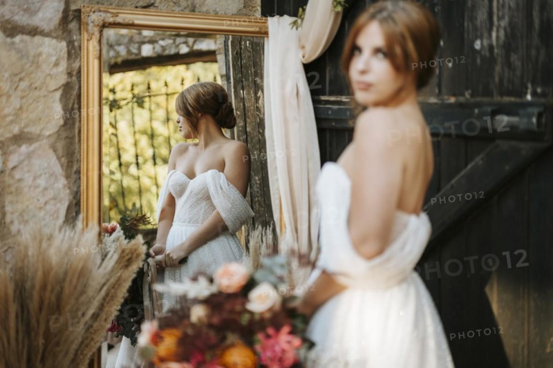 Beautiful bride in rustic arrangement