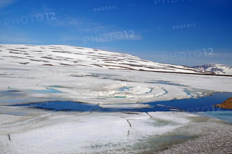 Lakes covered in ice that slowly breaks