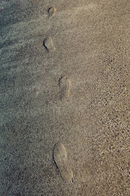 Footstep pattern seen on a concrete background