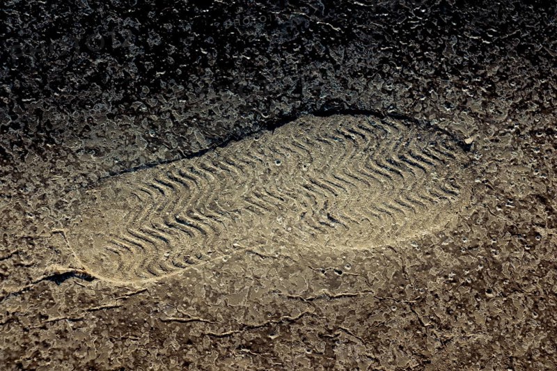 Footstep pattern seen on a concrete background