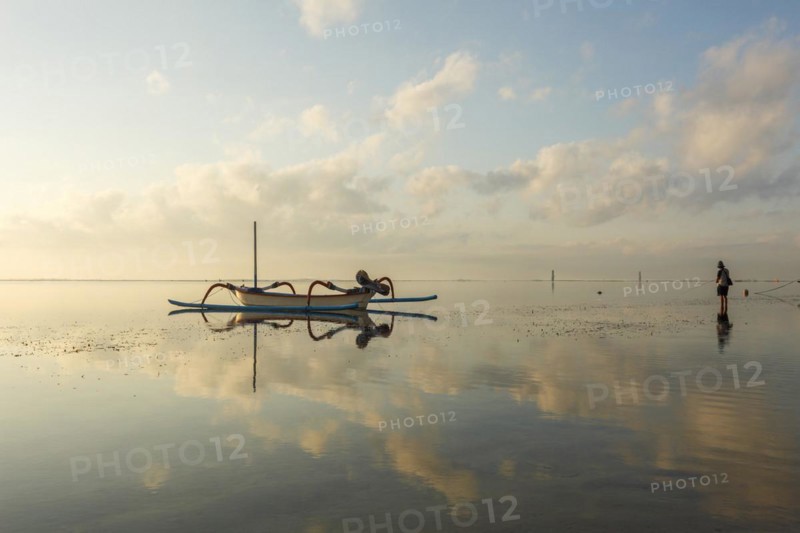 Fishing outriggers on the beach of Sanur