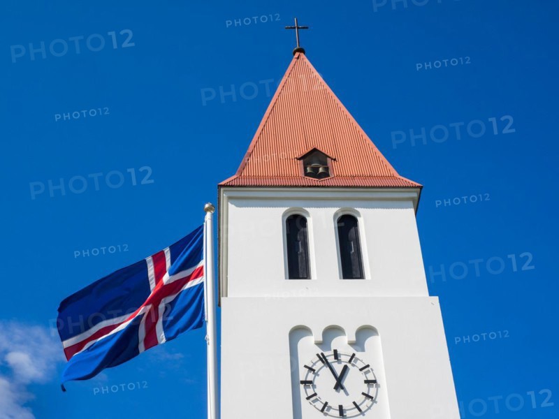 Church steeple and flag of Iceland