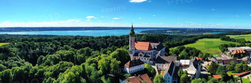 Aerial view of Andechs Monastery with the Lake Ammer lake in the background. Andechs