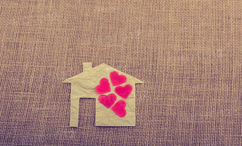 Model house and a heart shape beside it
