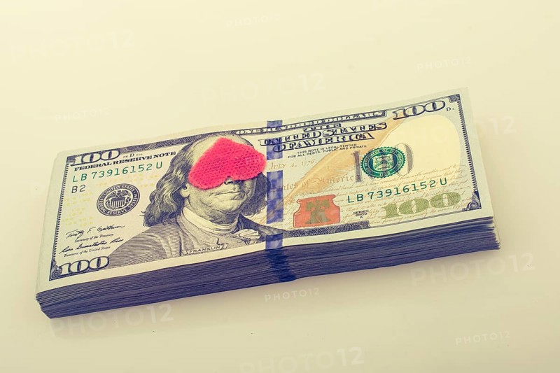 Red hearts and banknote bundle of US dollar
