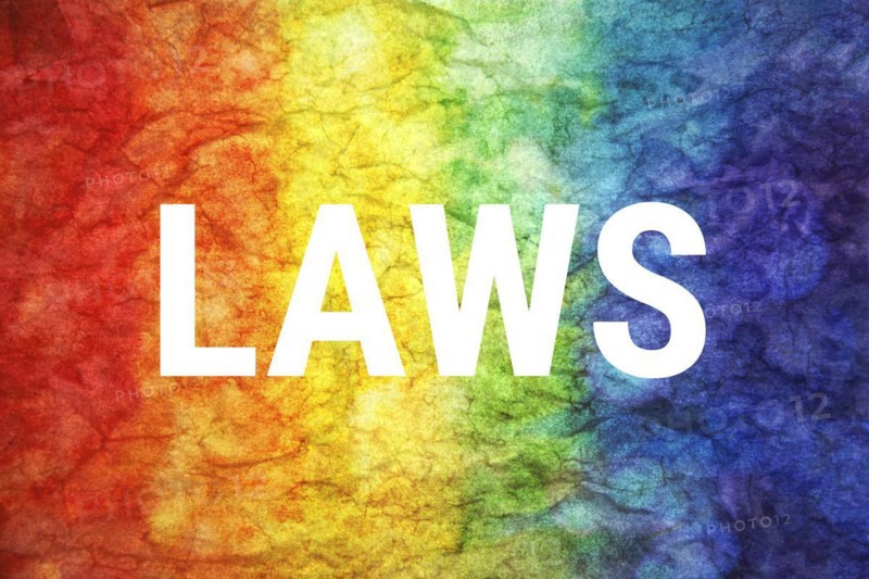Laws word on LGBT textured background