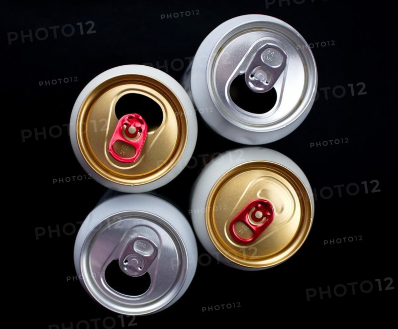 Three opened and one unopened beer cans