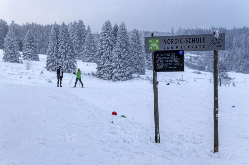 Sign Nordic school collection point in snowy landscape