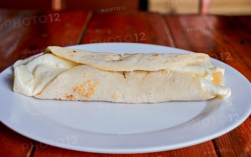 Traditional cheese dish with pickled onion and cream. Traditional Cheese with Pickled Onion